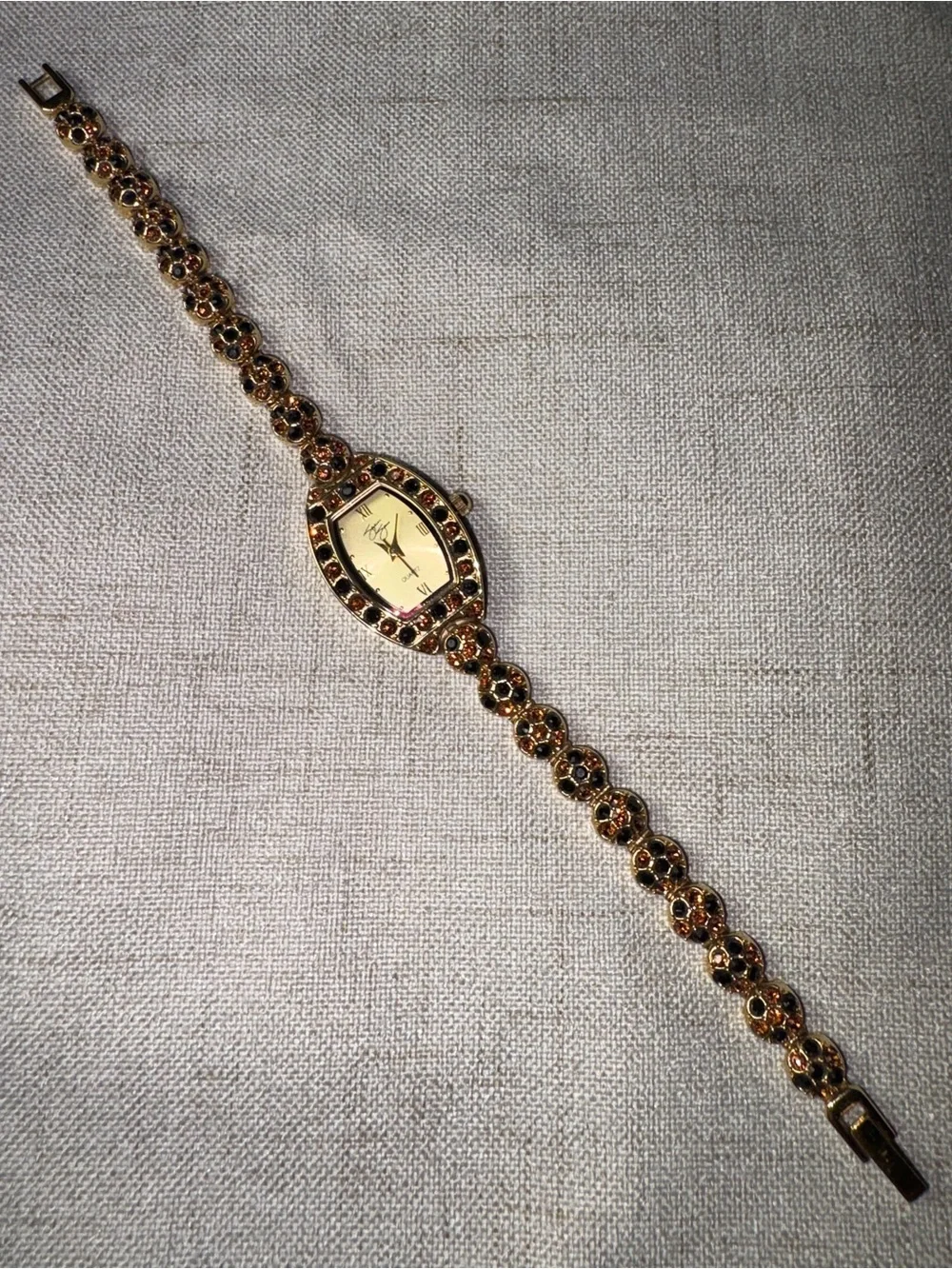 Gold-Tone Garnet Accent Womens Bracelet Watch